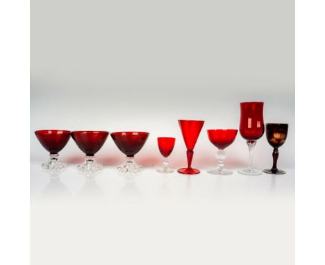 Discover a delightful ensemble featuring cordial glasses, wine glasses, and dessert glasses. Each piece in this collection sh