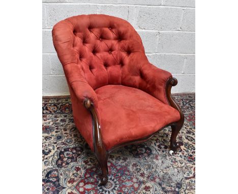 A 19th century spoon back chair with button back material, on swept feet.