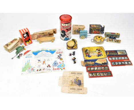 A collection of Mickey Mouse toys and ephemera comprising a Mickey and Donald's garden set no.85/7 with spade and rake, a bar