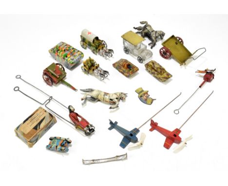 A collection of seven tinplate army toys comprising a German first aid wagon and two horses, length 15cm, a smaller similar G