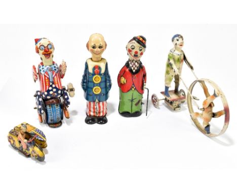 An early 20th century painted metal clockwork model of two clowns, one within a hoop, unmarked, height 13cm, with a British t