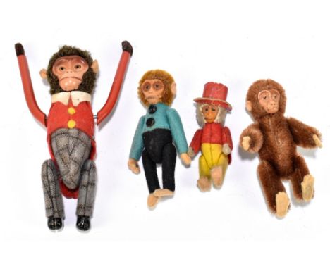 SCHUCO; a monkey scent bottle, in mid-brown plush, with a Schuco monkey brooch, a tin plate clockwork acrobatic monkey and a 