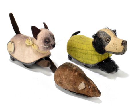 SCHUCO; three clockwork model animals comprising dog, cat and mouse, longest 12cm, and a clockwork bear (4)PROVENANCE: The Co