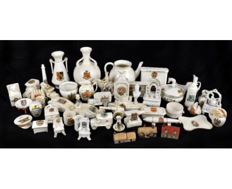 A large selection of crested china, including Goss examples, with a three handled Glamorganshire vase, height 19cm, an Aberde