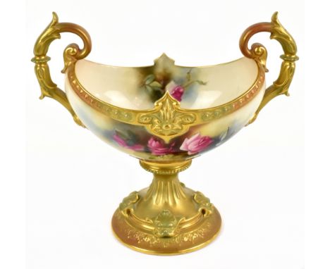 KITTY BLAKE FOR ROYAL WORCESTER; a twin handled pedestal centrepiece painted with roses inside moulded gilt detail with four 