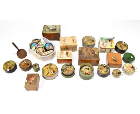 A collection of seventeen vintage metal and wood crank wind musical boxes, with a Mickey Mouse metal example, and a selection