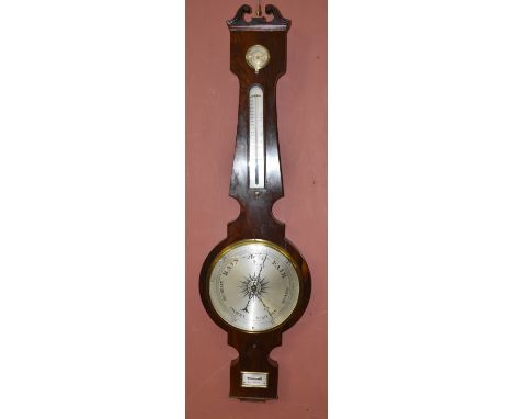 KEYNON OF STOCKPORT; an early 19th century rosewood wheel barometer, length 110cm.