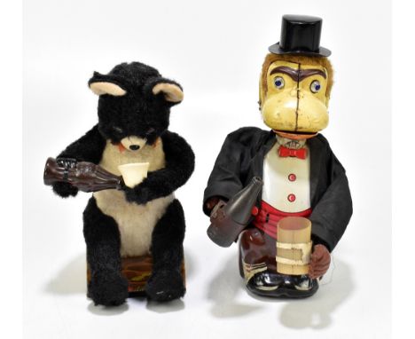 Two Japanese battery operated toys comprising a drinking monkey with tinplate face and a drinking bear holding a bottle of Co