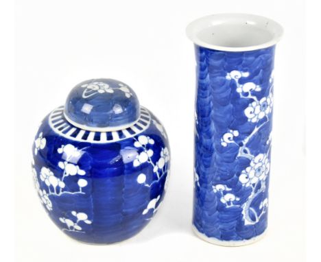 An early 20th century Chinese blue and white porcelain sleeve vase decorated with prunus flowers, bearing a Kangxi double rin