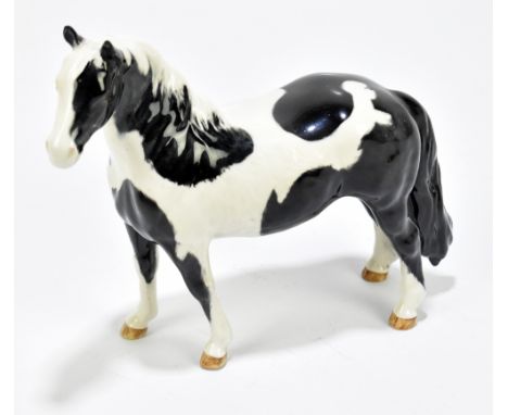 BESWICK; a model of a pinto pony, height 16cm.Additional InformationAppears good with no obvious signs of faults, damage or r