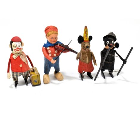 SCHUCO; four German clockwork figures comprising Dutch boy violinist, mouse, clown with a suitcase and a further figure of a 