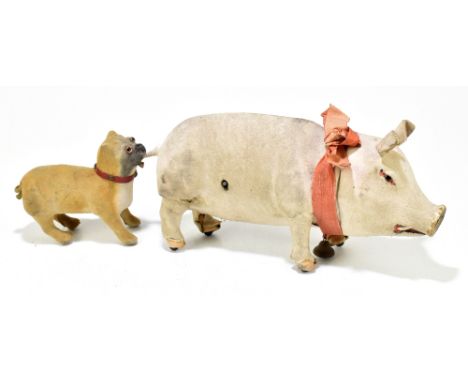 ROULLET & DECAMPS; a late 19th/early 20th century French clockwork automaton model of a pig and dog, the oinking pig and walk