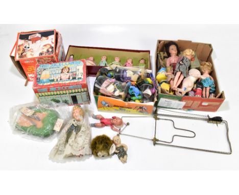 A collection of vintage dolls and games, mostly celluloid, to include a Happy Character doll by Peggy Nisbet, in box, a fruit