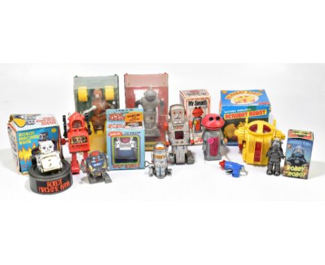 A collection of eleven battery operated and other tinplate and plastic robot toys, including a 'Mr Smash' by Marx Toys, a rep