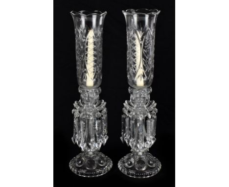 A pair of decorative modern glass table lustres with cut glass shades with flared rims on a baluster column with cut glass dr