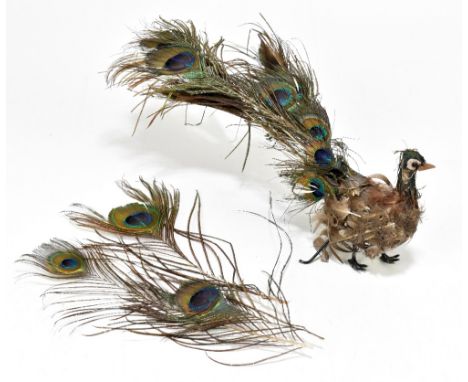 ROULLET & DECAMPS; a rare late 19th century walking peacock or clockwork automaton with real feather plumage and diecast legs