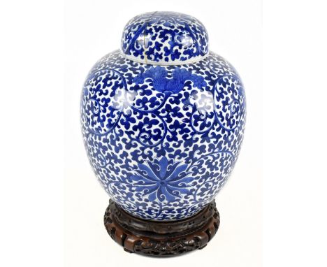 A 19th century Chinese blue and white porcelain ginger jar and cover painted with lotus flowers and scrolling decoration, bea