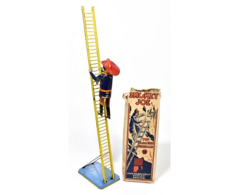 LOUIS MARX & CO LTD; a tinplate clockwork Smokey Joe, the climbing fireman, in original box.PROVENANCE: The Collection of Jac