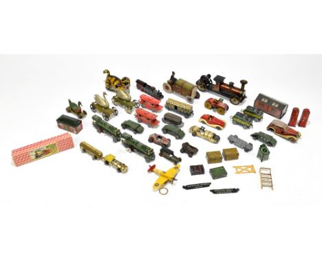 A collection of vintage tinplate model cars, trains, houses, etc, including a tractor, a no.575 locomotive, an RAF aeroplane,