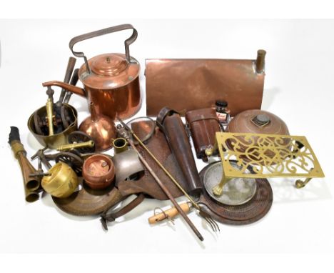 An assortment of metalware including a copper watering can, a copper funnel, an Eastern brass tray, also a leather pouch, a '
