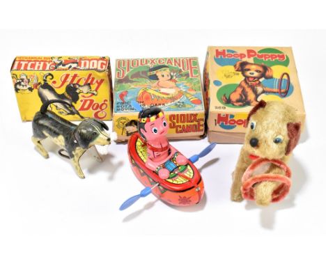 Three Japanese clockwork toys with boxes comprising 'Itchy Dog', 'Sioux Canoe', 'Hoop Puppy', each with box (3).PROVENANCE: T