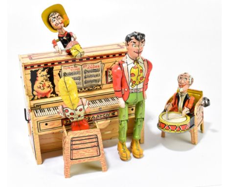 UNIQUE ART MANUFACTURING CO; Li'l Abner and his Dogpatch Band, a tinplate clockwork group of four figures around a piano with