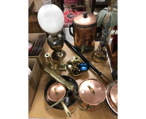 A collection of metal wares to include a pair of brass candlesticks, a brass chamber stick, a pair of enamel decorated bowls,