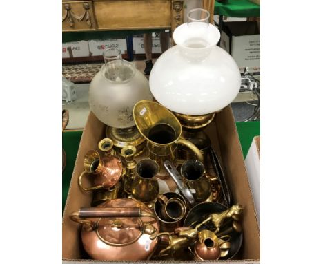 A collection of copper and brass wares to include a Victorian jelly mould of castellated form, 10 cm high, a copper kettle in