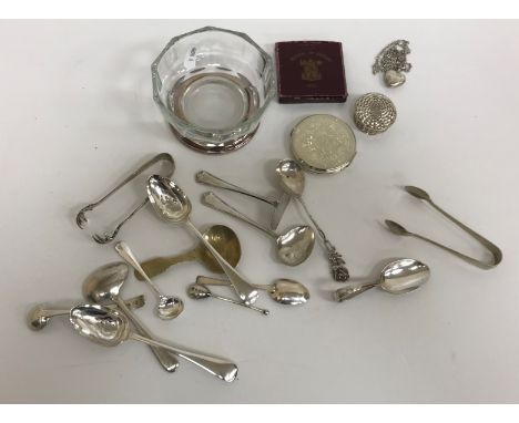 A collection of various silver spoons including salts, mustards, teaspoons and commemorative, including English, Continental 