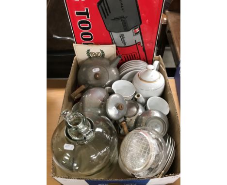 A box containing a Tudric pewter ware four piece tea set comprising tea pot, water jug, sugar bowl and milk jug, an Edinburgh