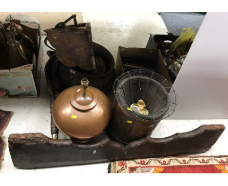 A collection of various metal wares to include copper milk pan, embossed jardiniere, sifter with turned wooden handle, oil la