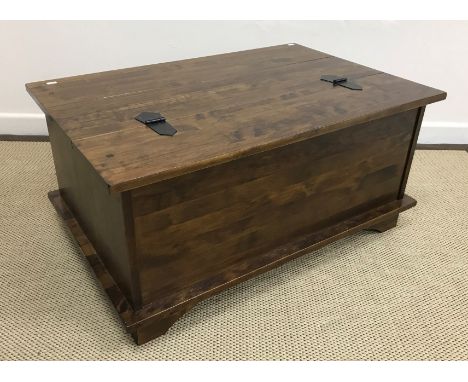 A Laura Ashley mahogany coffee table as a dwarf bank of nine apothecary style drawers, raised on bracket feet, 90 cm wide x 6