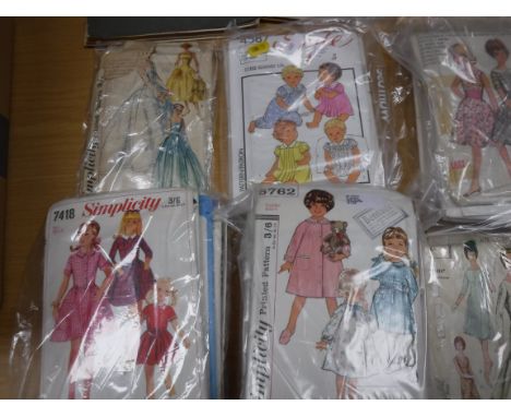 A collection of vintage and other Vogue, Simplicity, Style, Maudella bridalwear and childrens clothing patterns together with