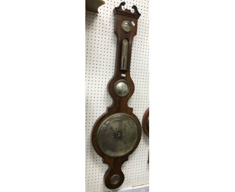 A Victorian rosewood cased banjo barometer thermometer with silvered dial 110cm length