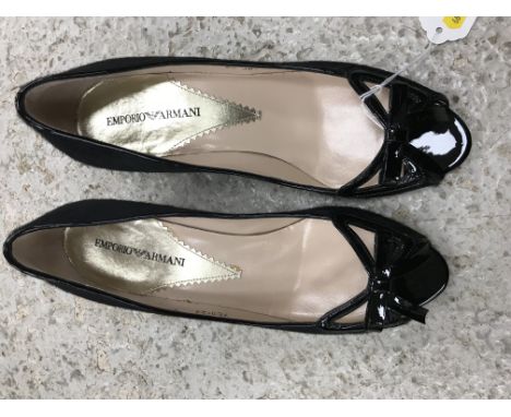 A box containing a pair of Emporio Armani shoes with black pony skin and black patent bow highlights, size 38½, unworn, toget