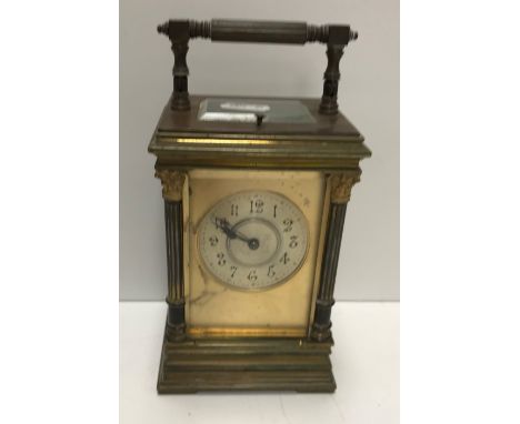 A 19th Century French lacquered brass cased carriage clock, the movement with repeat No'd 4631, unnamed with silvered chapter