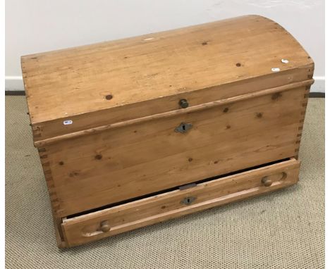A 19th Century pine dome top trunk with single drawer and iron carrying handles 95 cm wide x 53 cm deep x 63 cm high