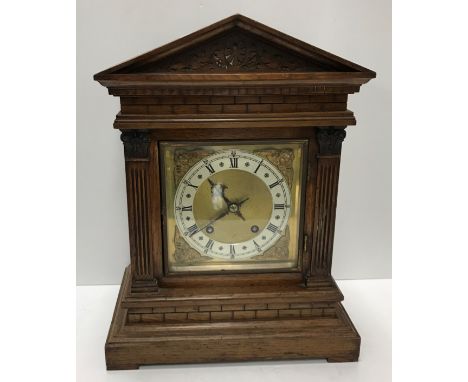 A circa 1900 oak cased mantel clock of architectural form, the eight day German movement by Winterhalder &amp; Hofmeier with 