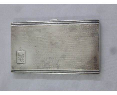 A rectangular engine turned silver hallmarked cigarette case