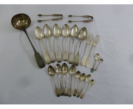 A quantity of Irish silver antique fiddle pattern flatware to include a soup ladle, six table spoons, forks and two pairs of 
