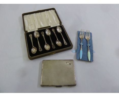 A silver cigarette case Birmingham 1917, a cased set of silver teaspoons and two Danish white metal and enamel cake forks