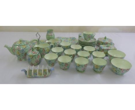 Shelley Melody 13453 teaset to include plates, cups, saucers, teapot, milk jug, sugar bowl, butter dish, cheese dish and cove