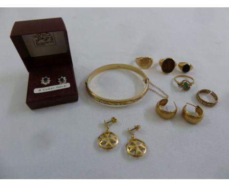 A quantity of 9ct gold jewellery to include rings, earrings and a bangle, approx total weight 36.4g  (11)