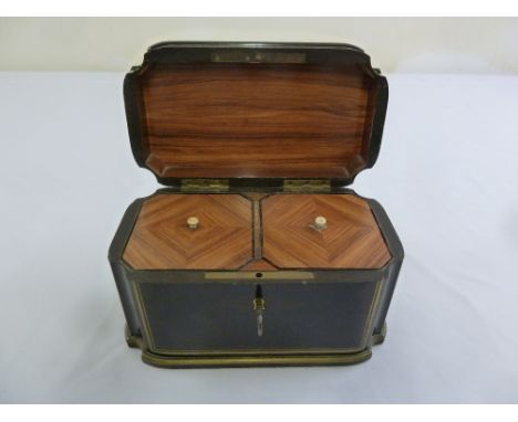 A French brass inlaid shaped rectangular tea caddy, the hinged cover revealing two compartments with pull off covers
