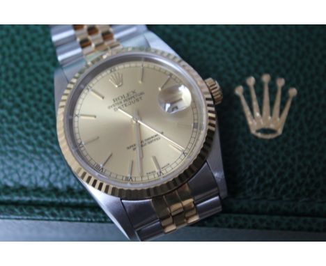 ROLEX - A BI COLOUR OYSTER PERPETUAL DATEJUST SUPERLATIVE CHRONOMETER, coming with watch purchase receipt from 'The Hour Glas