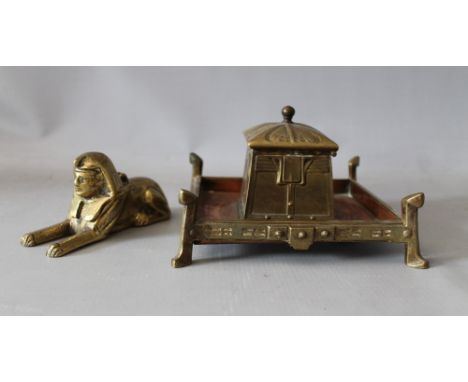 A 19TH CENTURY ART NOUVEAU BRASS DESK TOP INKWELL BASE, with hinged lid, H 12 cm, base 15 x 15 cm, together with a brass inkw