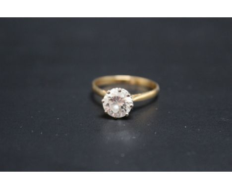 AN 18CT GOLD DIAMOND SOLITAIRE RING, the diamond is an estimated 2 carats and being of good colour with some inclusions visib