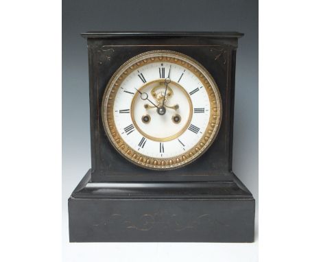 A LARGE BLACK SLATE BELL STRIKE MANTLE CLOCK, the large white enamel dial with outer convex chapter ting and flat inner dial 