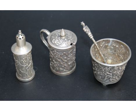 A CHINESE FLOWERING PRUNUS THREE PIECE SILVER CRUET SET,  stamped to base HM and 90 together with an unmarked white metal sal