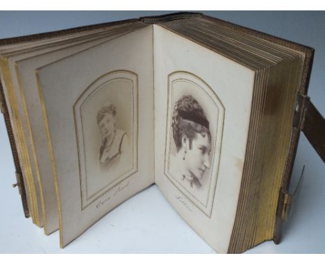 A FRENCH PHOTO ALBUM AND CONTENTS 'LES PLUS JOLIES ACTRICES DE PARIS EN 1867-1870', containing approximately 49 carte de visi